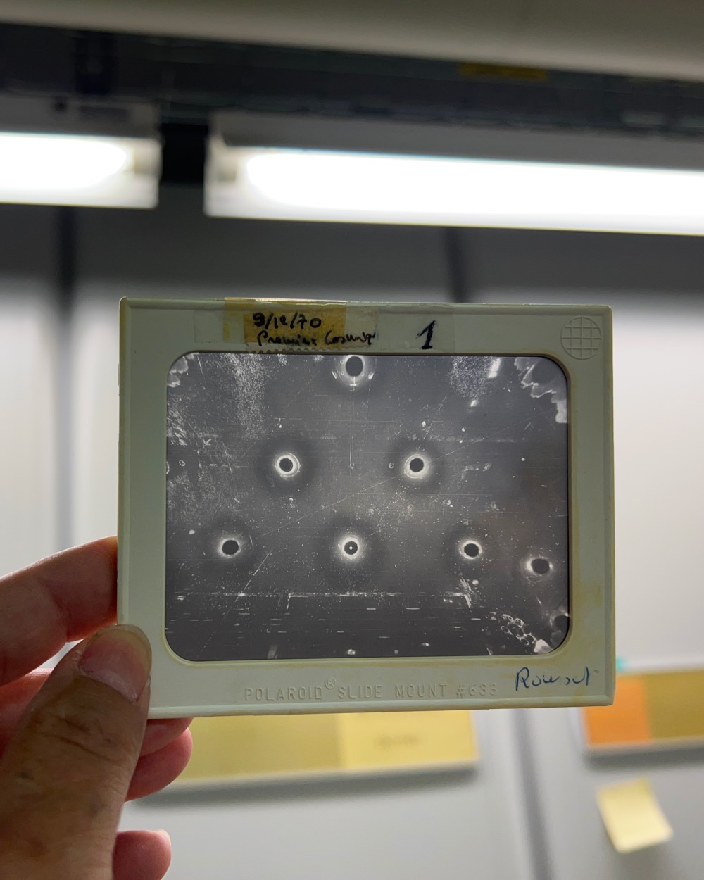 Photograph of particle tracks seen in the Gargamelle bubble chamber from 1970 in the CERN's archives. Photo by Tania Candiani