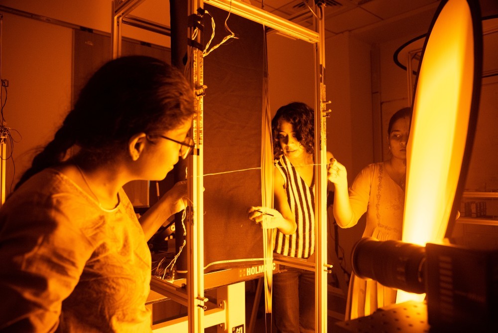 Rohini Devasher conducting a laboratory experiment on soap films in collaboration with scientists at ICTS