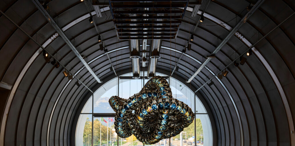 Chroma VII by Yunchul Kim, a striking sculpture of diverse glass beads, featured in the Exploring the Unknown exhibit at CERN, 2023.