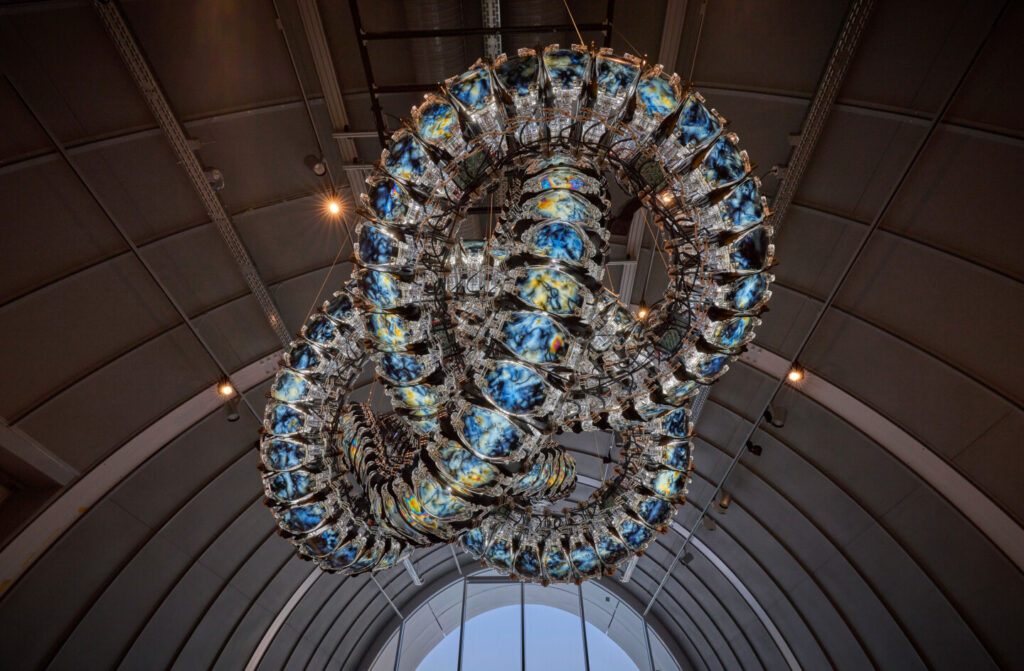 Chroma VII by Yunchul Kim, a striking sculpture of diverse glass beads, featured in the Exploring the Unknown exhibit at CERN, 2023.